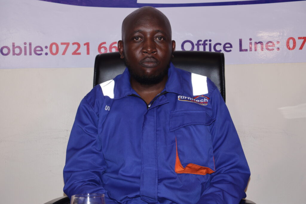 Furnitech's Ceo at the main office posing for a photo during the 10 Years Anniversary celebration.