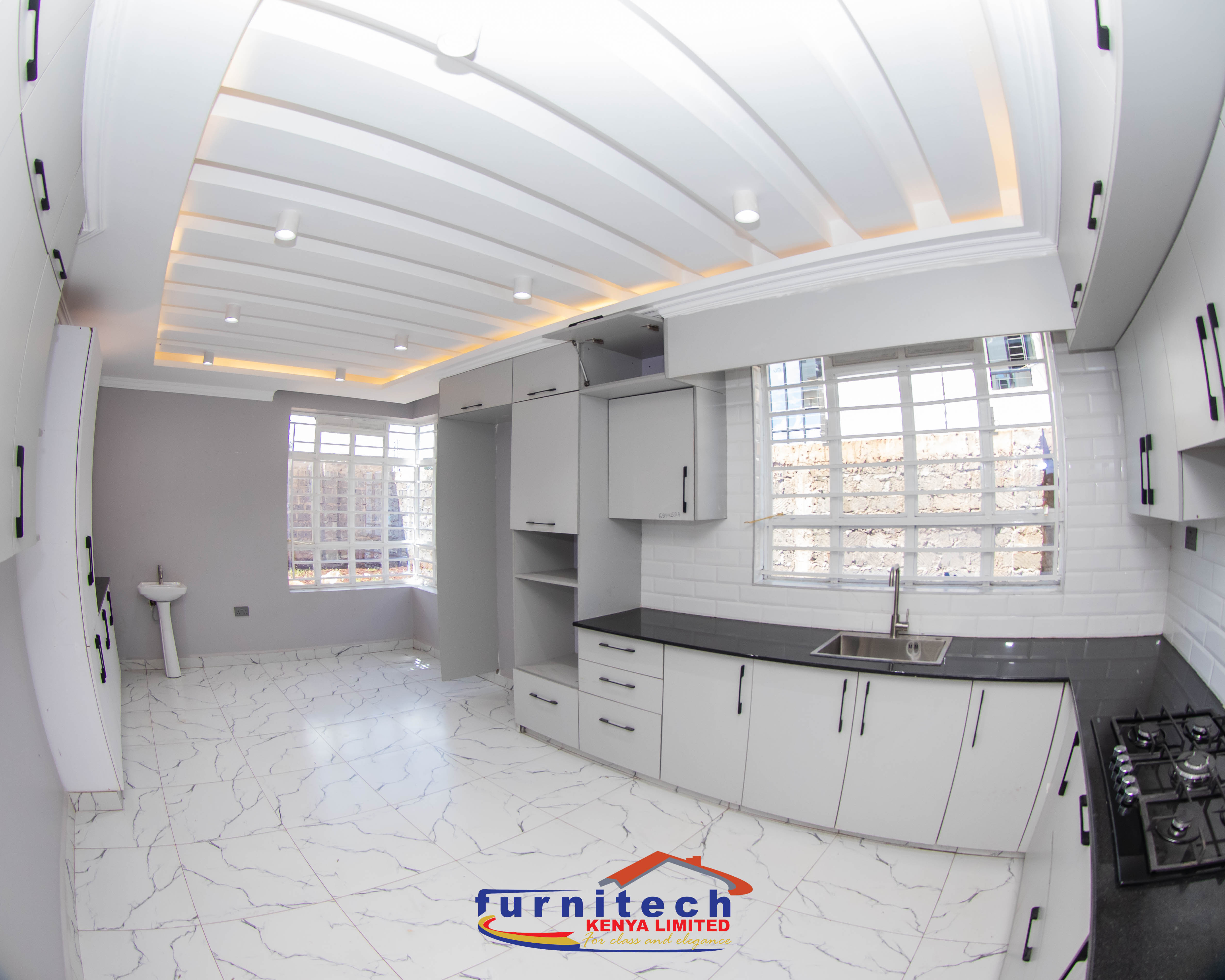 Modern Kitchen at a home in Kenyatta Road off Thika Road in Kenya with gypsum ceilings that are long lasting and resistant and designed for use in a kitchen