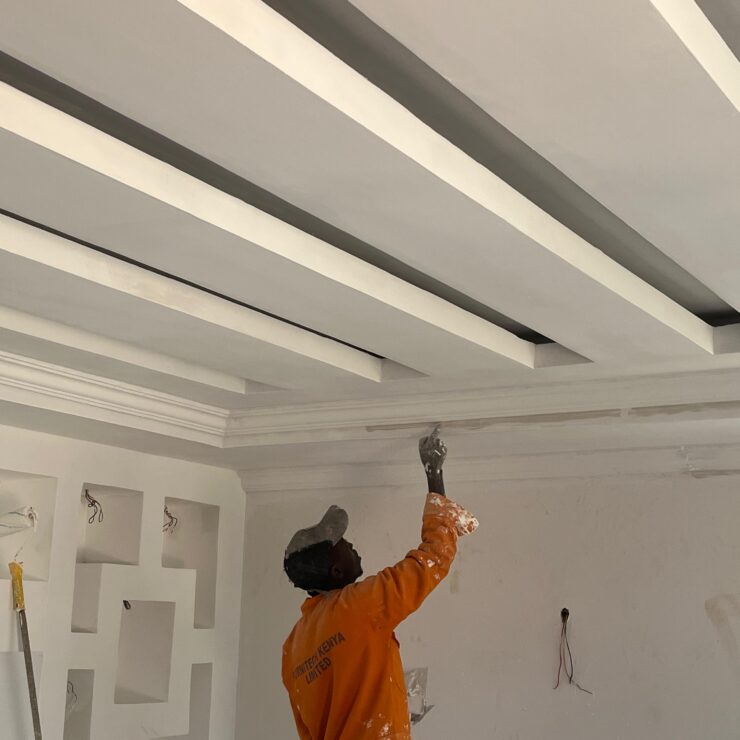 Man painting a ceiling. Cheap Painting Services. Painting Services Expert