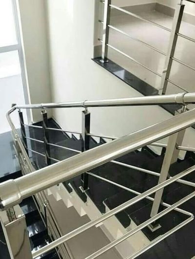 Staircase with stainless steel handrails