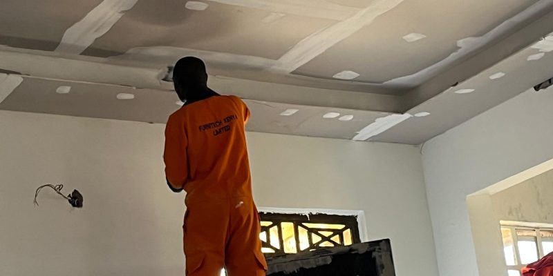Man painting on a ceiling. Afordable painting services