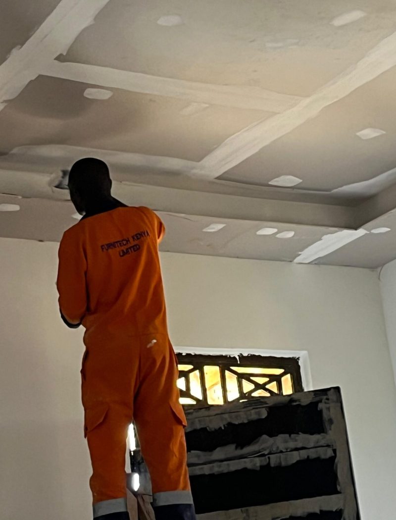 Man painting on a ceiling. Afordable painting services