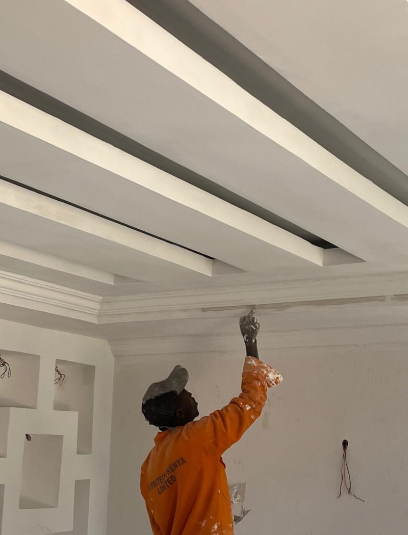 Man painting a ceiling. Cheap Painting Services. Painting Services Expert