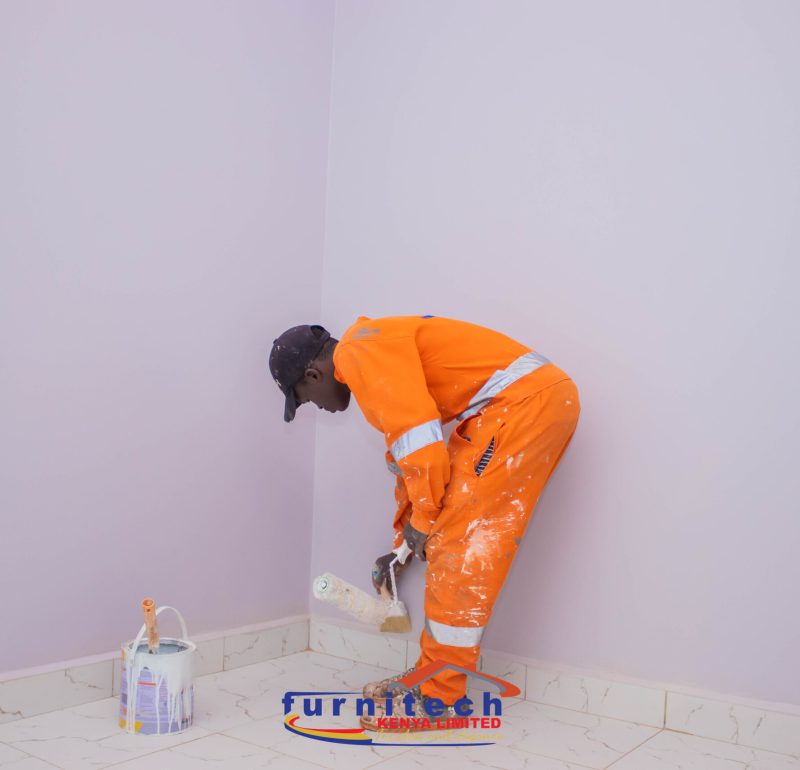 Painting a house in Kenyatta road using wall paint. Painting Services in kenya